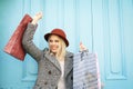 Happy young girl satisfied after shopping. Royalty Free Stock Photo