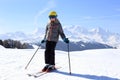 Happy young girl with ski