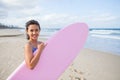 Happy young girl with surfboard Royalty Free Stock Photo