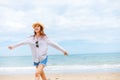 Happy young girl walking on the beach. Freedom on the beach Royalty Free Stock Photo