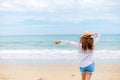 Happy young girl walking on the beach. Summer travel, vocation, holiday concept Royalty Free Stock Photo