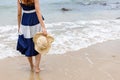 Happy young girl walking on the beach. Summer travel, vocation, holiday concept Royalty Free Stock Photo