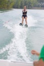 Happy young girl on water ski Royalty Free Stock Photo