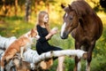 Happy young girl with your favorite pets Royalty Free Stock Photo