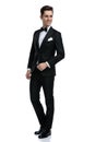 Happy young groom in tuxedo looking to side Royalty Free Stock Photo