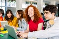 Happy young group of diverse students studying together and working together Royalty Free Stock Photo