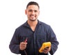 Happy young Hispanic electrician Royalty Free Stock Photo