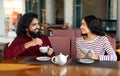 Happy young indian couple have romantic date at cafe Royalty Free Stock Photo