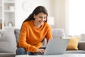 Happy young indian woman freelancer working from home, copy space Royalty Free Stock Photo