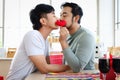 Happy young LGBT couple sharing romantic special moment together on Valentine Day, Asian gay male lover kissing behind red heart Royalty Free Stock Photo