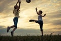 Happy young little boy and girl playing in the field with socce Royalty Free Stock Photo