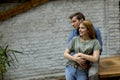 Happy young lovely couple in the kitchen hugging each other Royalty Free Stock Photo