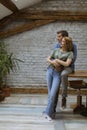 Happy young lovely couple in the kitchen hugging each other Royalty Free Stock Photo