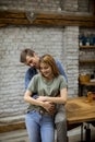 Happy young lovely couple in the kitchen hugging each other Royalty Free Stock Photo