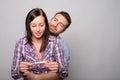Happy young lovers couple happy after pregnancy test re Royalty Free Stock Photo