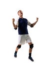 Happy young male caucasian handball player celebrating goal against white background Royalty Free Stock Photo