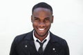 Happy young male fashion model in leather jacket and tie Royalty Free Stock Photo