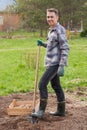 Happy Young Male With Shovel And Wooden Box With Seedling Potato Royalty Free Stock Photo