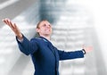 Happy young man aircraft pilot over glass modern building