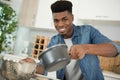 happy young man with apron cooking pasta Royalty Free Stock Photo