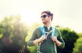 Happy young man with backpack hiking outdoors Royalty Free Stock Photo