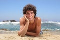 Happy young man on the beach Royalty Free Stock Photo