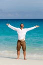 Happy young man on the beach Royalty Free Stock Photo