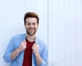 Happy young man with beard against white background Royalty Free Stock Photo