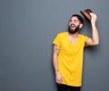 Happy young man with beard laughing