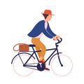 Happy young man or boy wearing casual clothes and hat riding bike. Smiling male character on bicycle. Pedaling bicyclist Royalty Free Stock Photo
