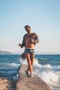 Happy young man dancing on the dock Royalty Free Stock Photo