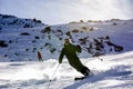 Happy young man enjoying winter vacations in mountains, Val Thorens