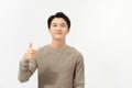 Happy young man giving thumbs up success hand sign smiling and happy Royalty Free Stock Photo