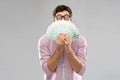 Happy young man in glasses with fan of euro money Royalty Free Stock Photo
