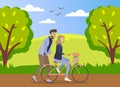 Happy young man is helping a smiling woman to ride a bicycle on the road at summer forest background