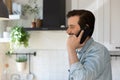 Happy young man holding cellphone call talk. Royalty Free Stock Photo