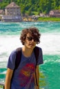 Happy young man insunglasses in rhine falls, Switzerland Royalty Free Stock Photo