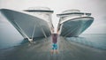 Happy young man on the pier with a cruise liner, a man traveling on a cruise ship. A happy man in the port near the ocean.