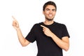 Happy young man pointing finger at ads Royalty Free Stock Photo