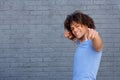 Happy young man pointing fingers Royalty Free Stock Photo