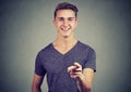 Happy young man pointing his finger at you Royalty Free Stock Photo