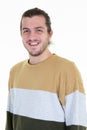 Happy young man portrait handsome guy in casual sweater shirt long haired smiling standing against white background Royalty Free Stock Photo