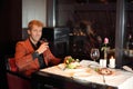 Happyman in red suit in a restaurant