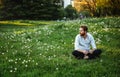 Happy young man rest on meadow. Nature, people concept Royalty Free Stock Photo