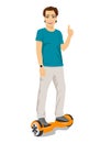 Happy young man riding gyroscooter and giving thumbs up - eco transport, hoverboard, smart balance wheel Royalty Free Stock Photo