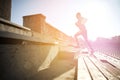 Happy young man running upstairs on stadium Royalty Free Stock Photo