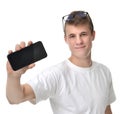 Happy young man show display of mobile cell phone with blank scr Royalty Free Stock Photo