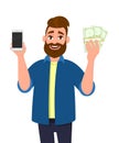 Happy young man showing or holding a mobile, cell, smart phone and bunch of cash, money, dollar, currency, bank notes in hand. Royalty Free Stock Photo