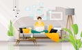 Happy young man sitting on sofa with laptop in living room, working at home Royalty Free Stock Photo