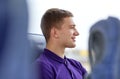 Happy young man sitting in travel bus Royalty Free Stock Photo